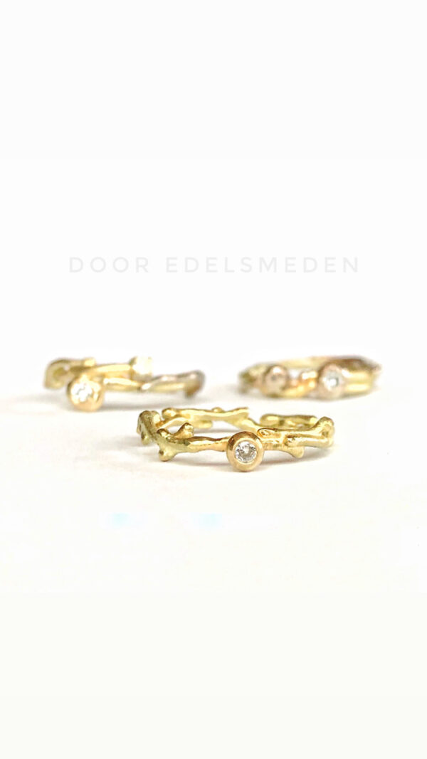 Gouden 'takjes' ringen met diamant